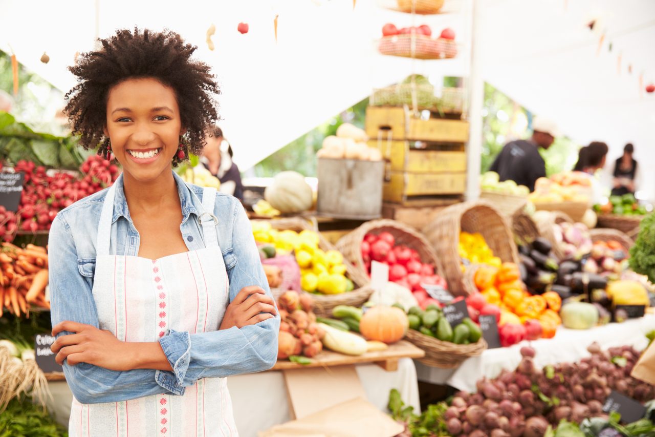 Woman standing at farmer's market